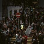 Understanding the Political Leaning of The New York Times 40 people walking on street during nighttime