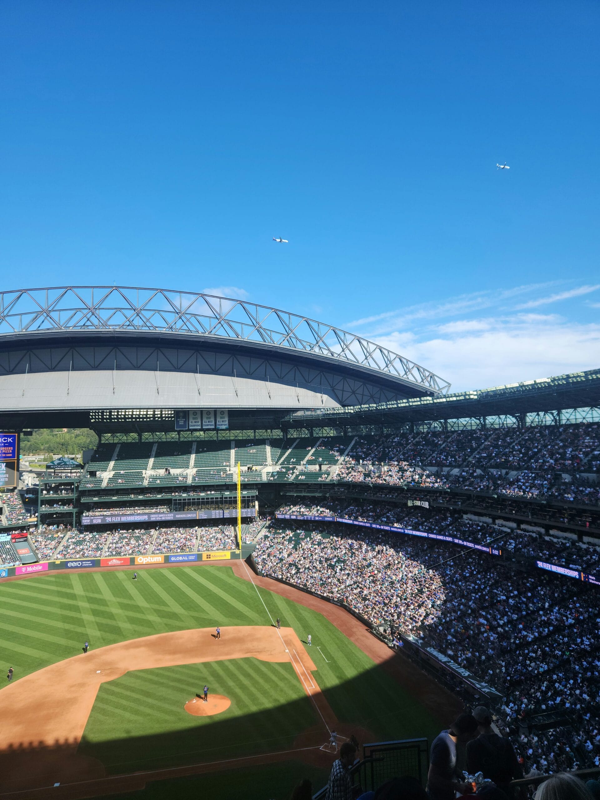 A baseball stadium filled with lots of people