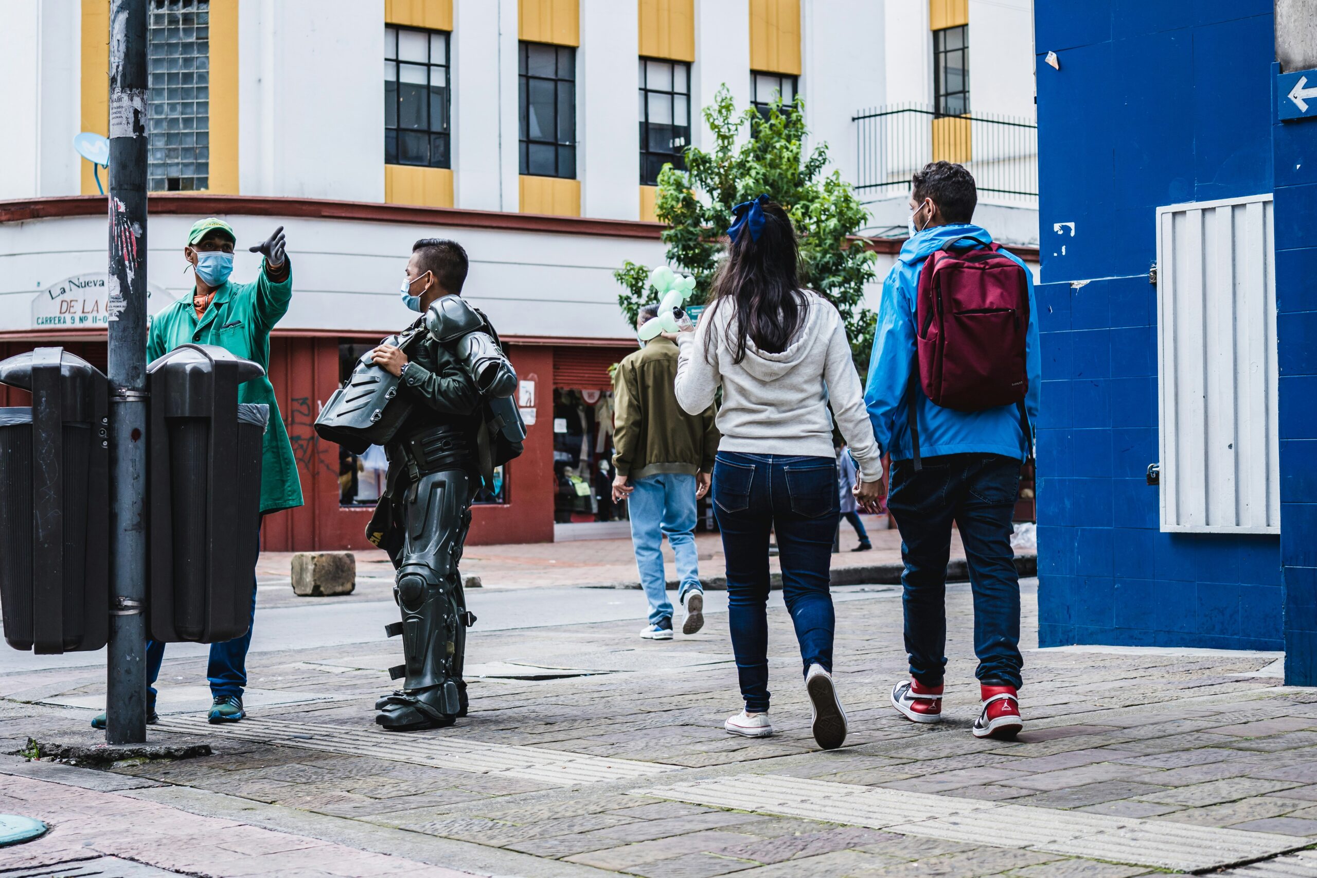 people walking on sidewalk during daytime