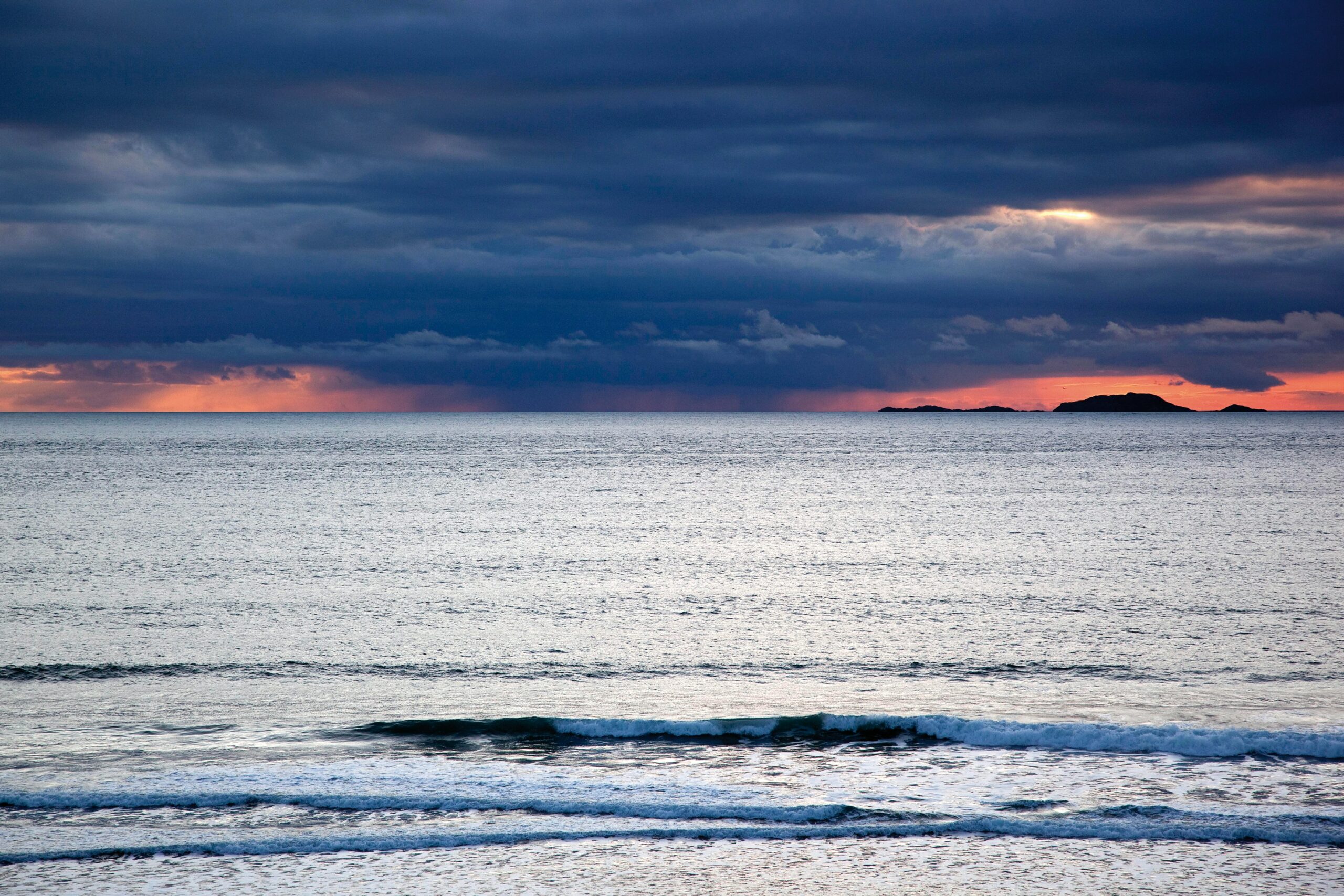 water waves under gray sky