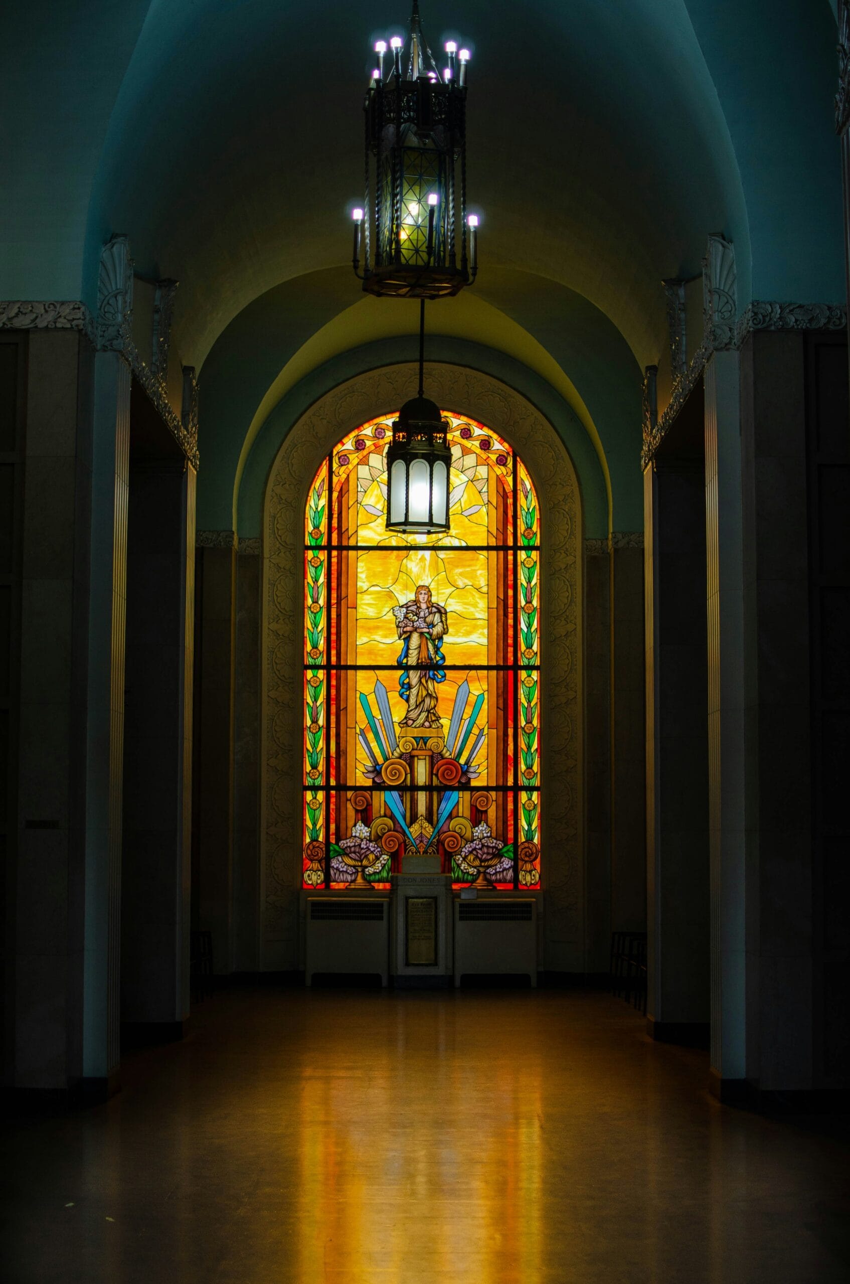 A large stained glass window in a building