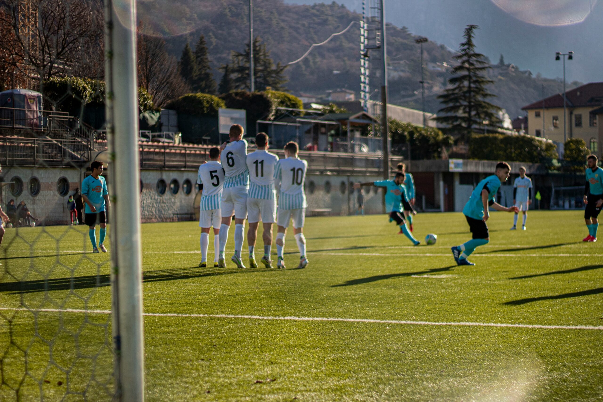 a group of young men playing a game of soccer