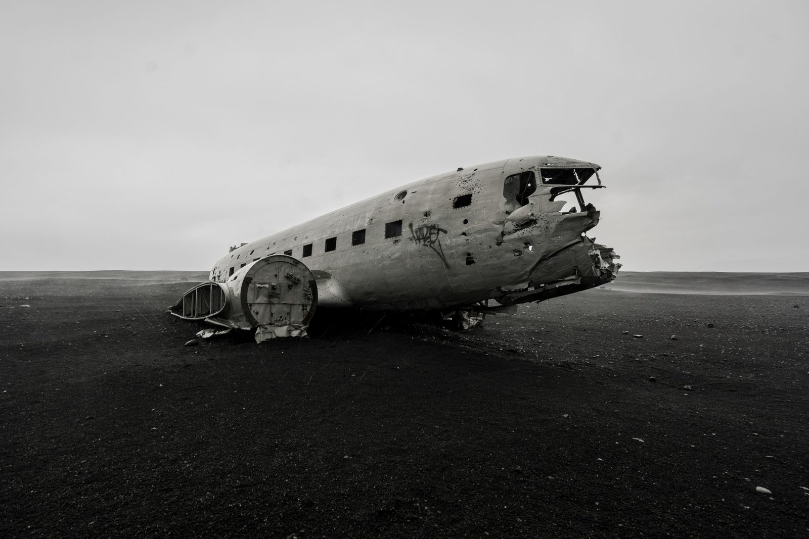 crashed gray airliner