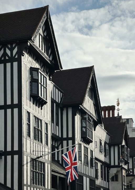 a building with a flag hanging from it's side